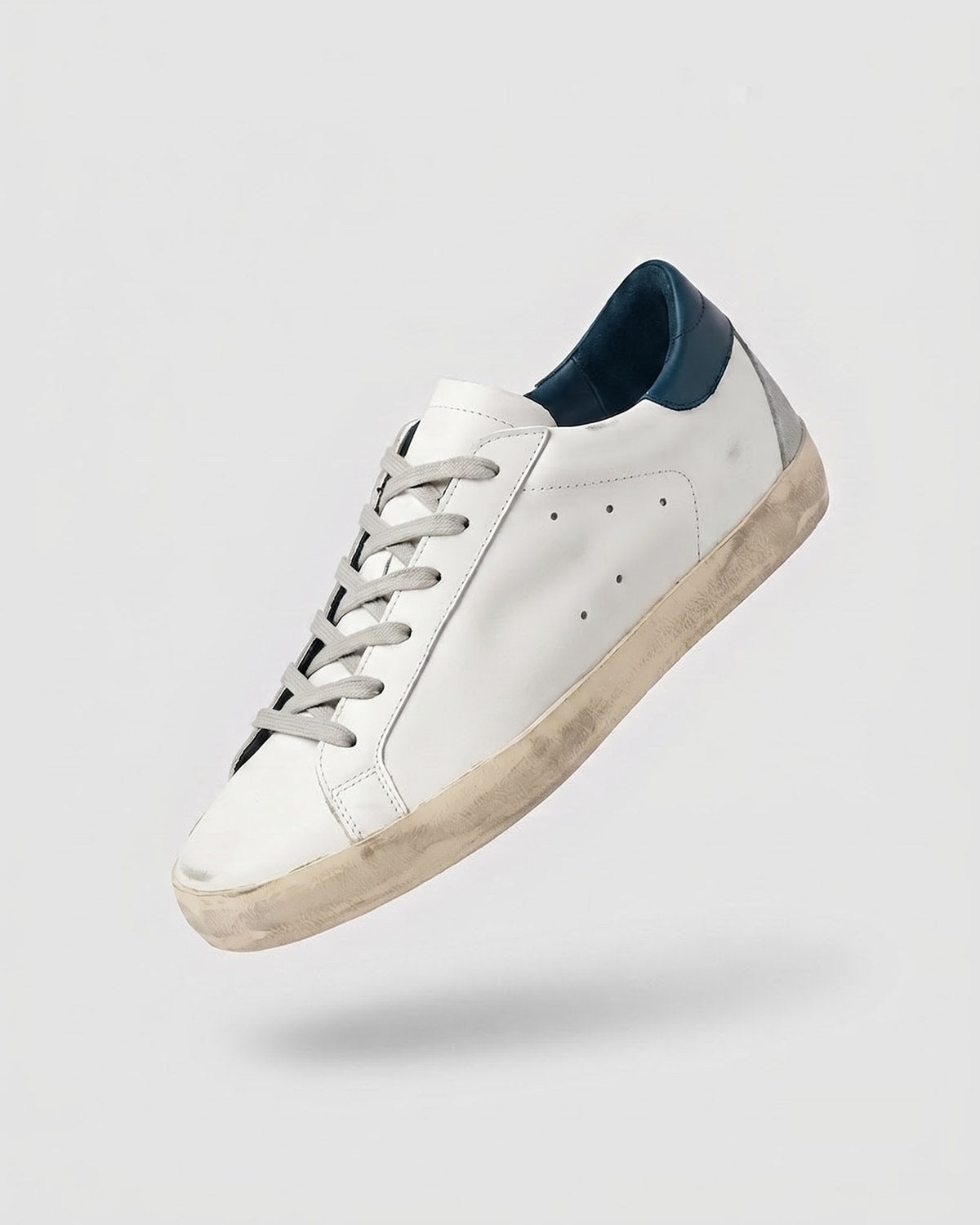 Sableau Star Sneakers in Petrol Blue — white leather, petrol blue heel tab, silver star