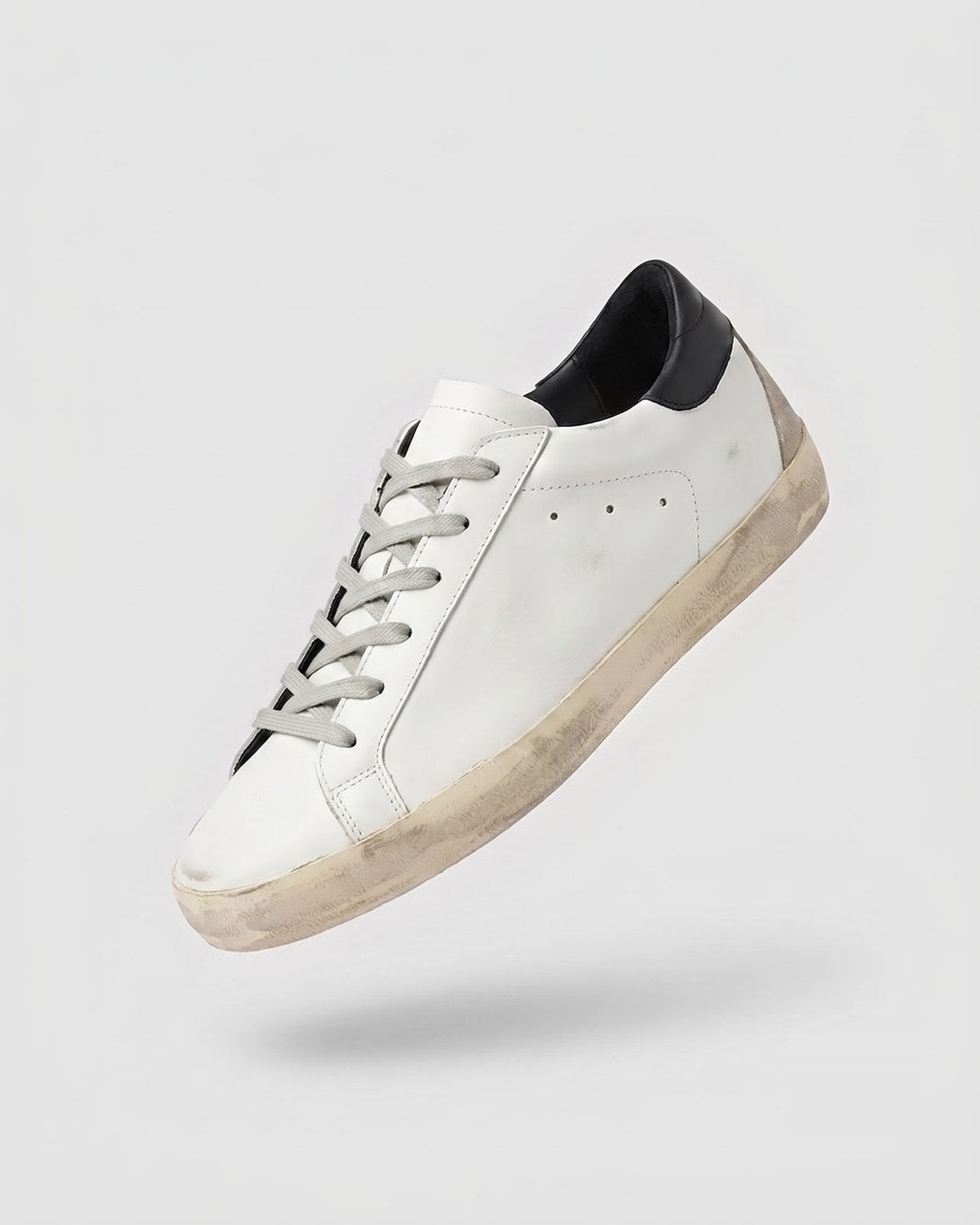 Sableau Star Sneakers in Black — white leather, black heel tab, beige suede star