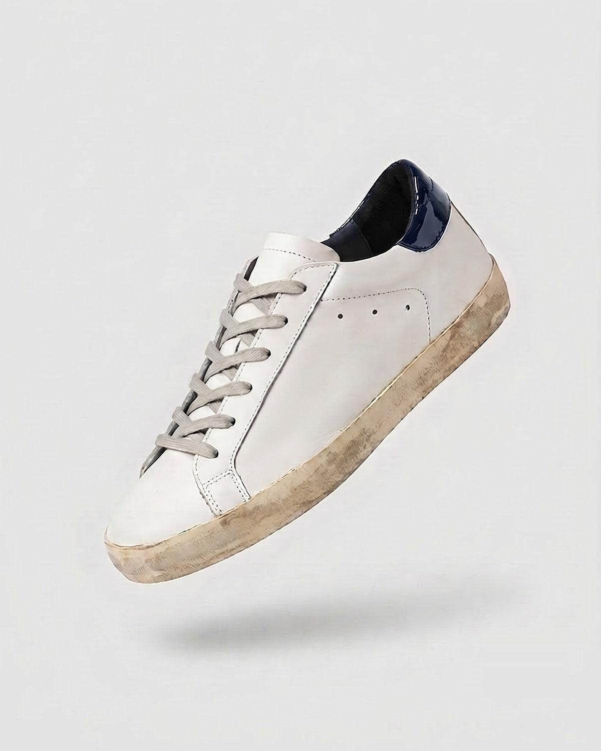 Sableau Star Sneakers in Gloss Navy — white leather, glossy patent dark navy heel tab, beige suede star