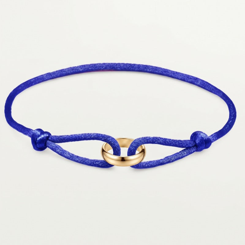 Sableau Trio Cord Bracelet in royal blue, three-tone steel rings on an adjustable cord