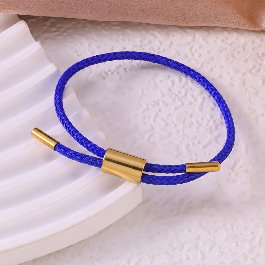 Sableau Woven Steel Bracelet in royal blue, braided steel cord with a gold-plated slide clasp