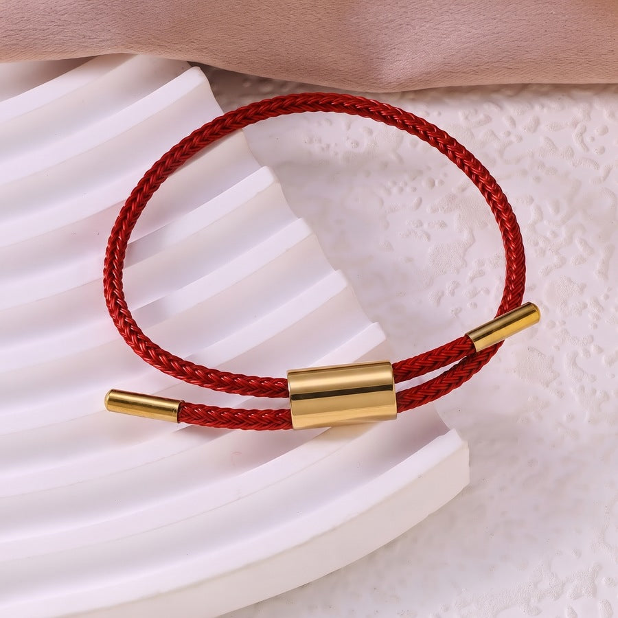Sableau Woven Steel Bracelet in wine red, braided steel cord with a gold-plated slide clasp