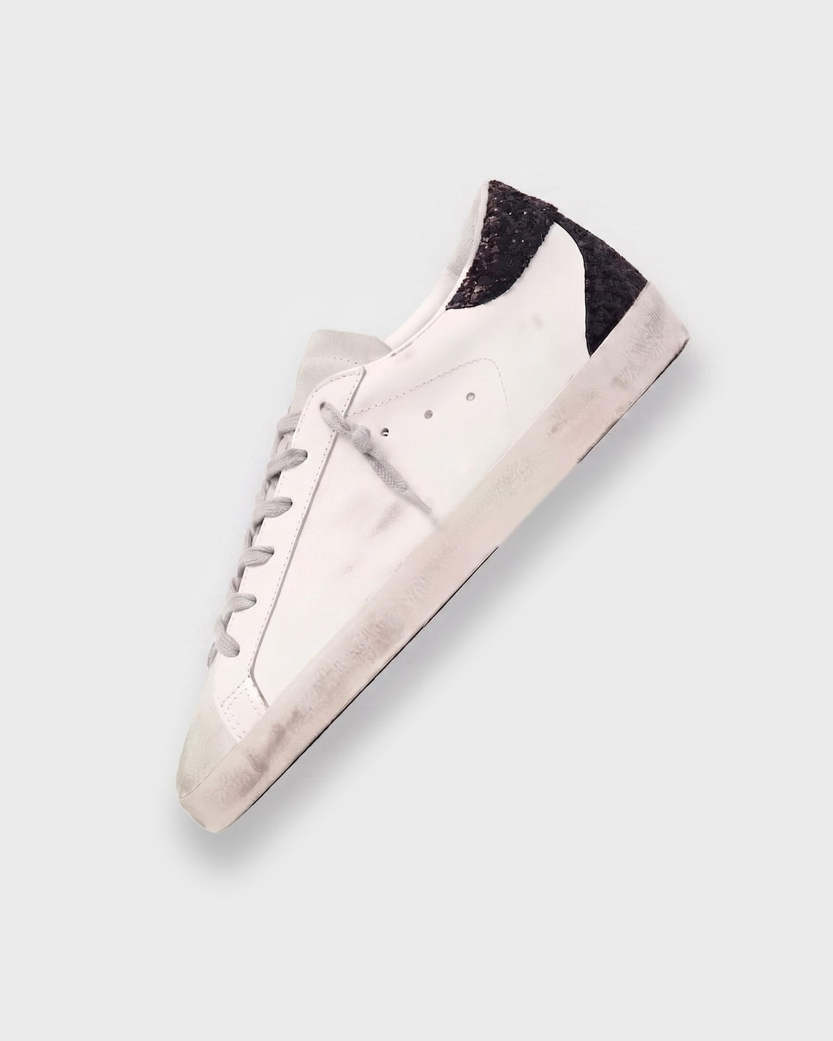 Sableau Glitter Star Sneakers in Black Gold — white leather, black glitter heel tab, gold glitter star
