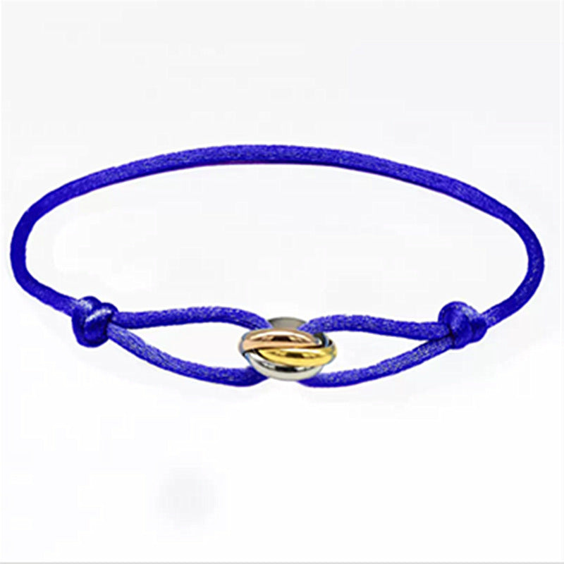 Sableau Trio Cord Bracelet in royal blue, three-tone steel rings on an adjustable cord