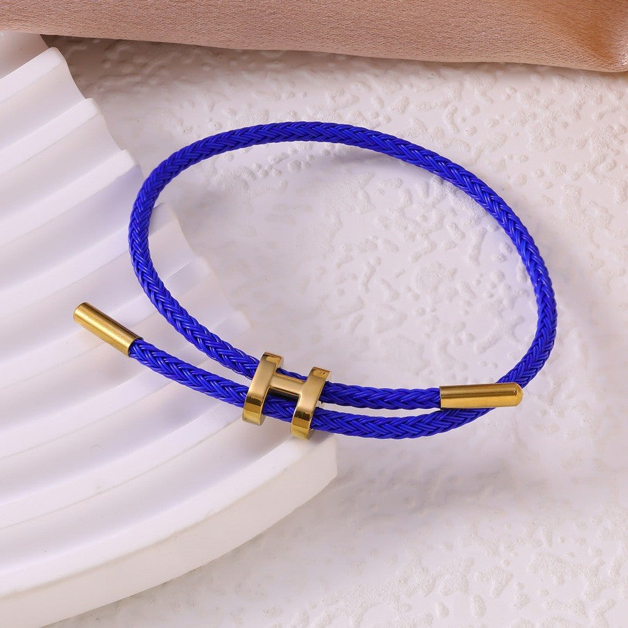 Sableau Woven Steel Bracelet in royal blue, braided steel cord with a gold-plated slide clasp