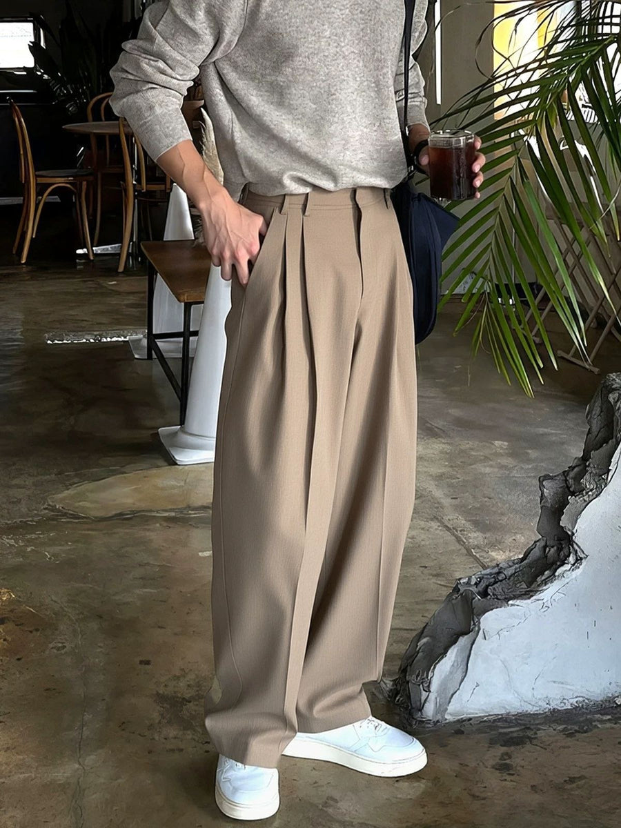 Sableau Buckle-Tab Pleated Trousers in Beige
