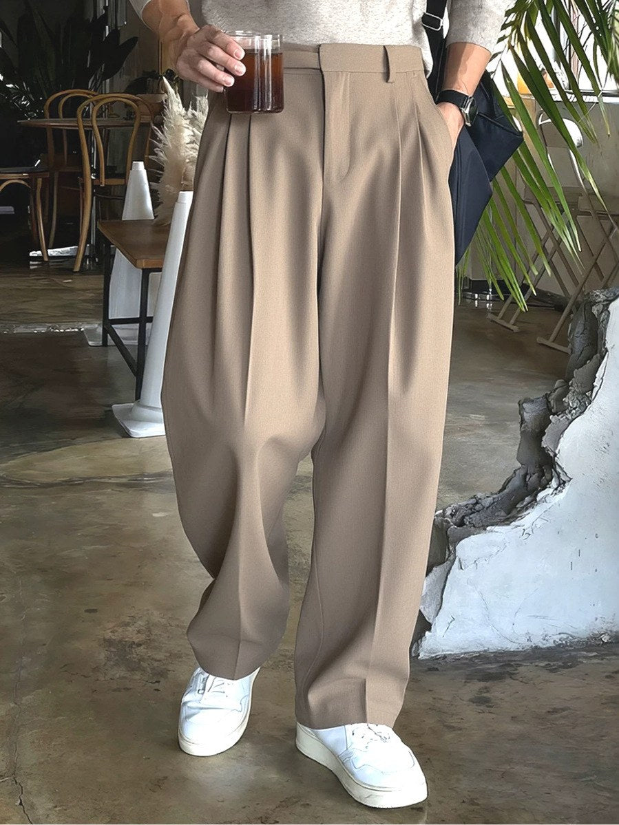 Sableau Buckle-Tab Pleated Trousers in Beige