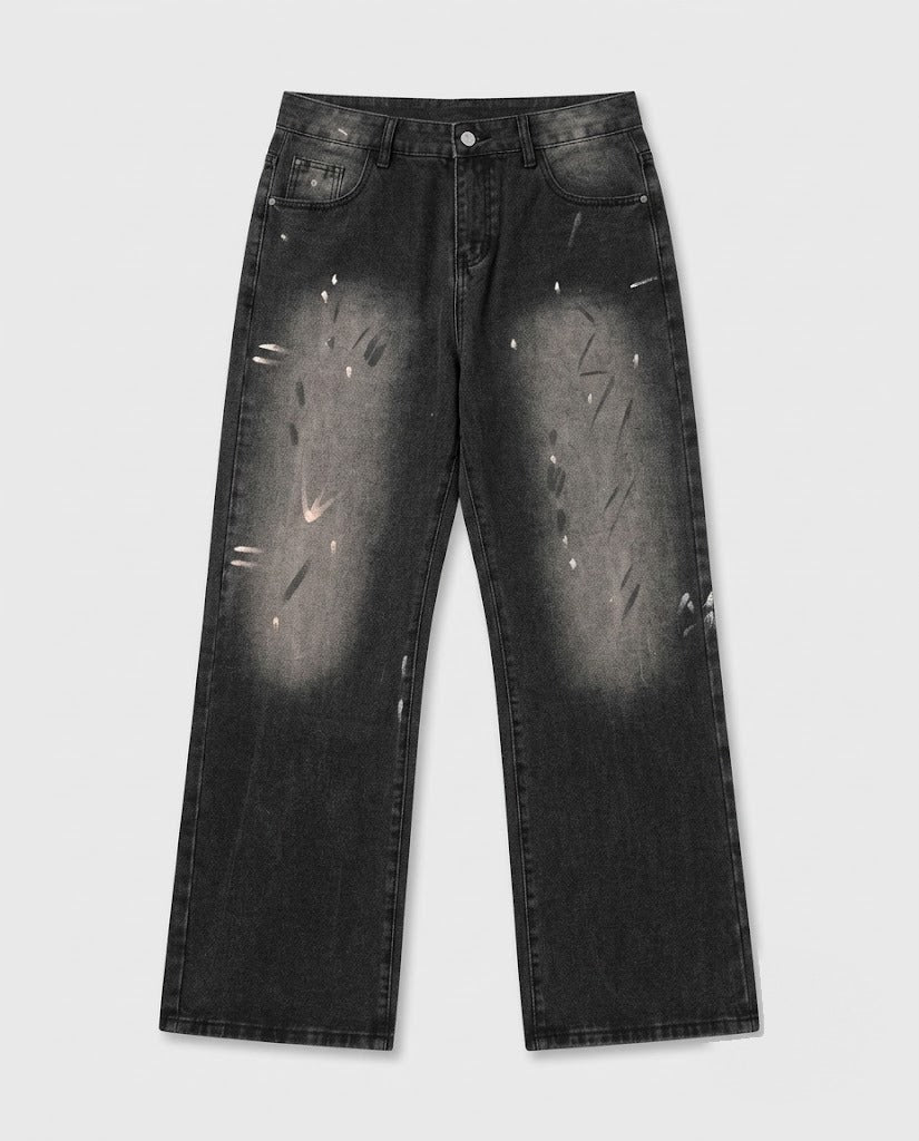 Black spray-wash straight-leg jeans — flat lay