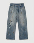 Blue paint-splatter straight-leg jeans — flat lay