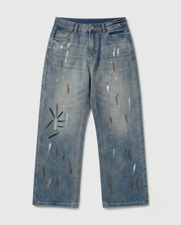 Raka jeans med blå färgstänk – flat lay