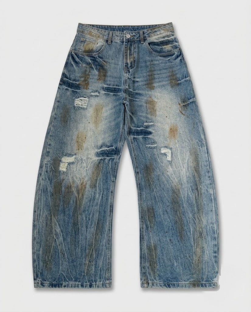 Earth-toned distressed straight-leg jeans — flat lay