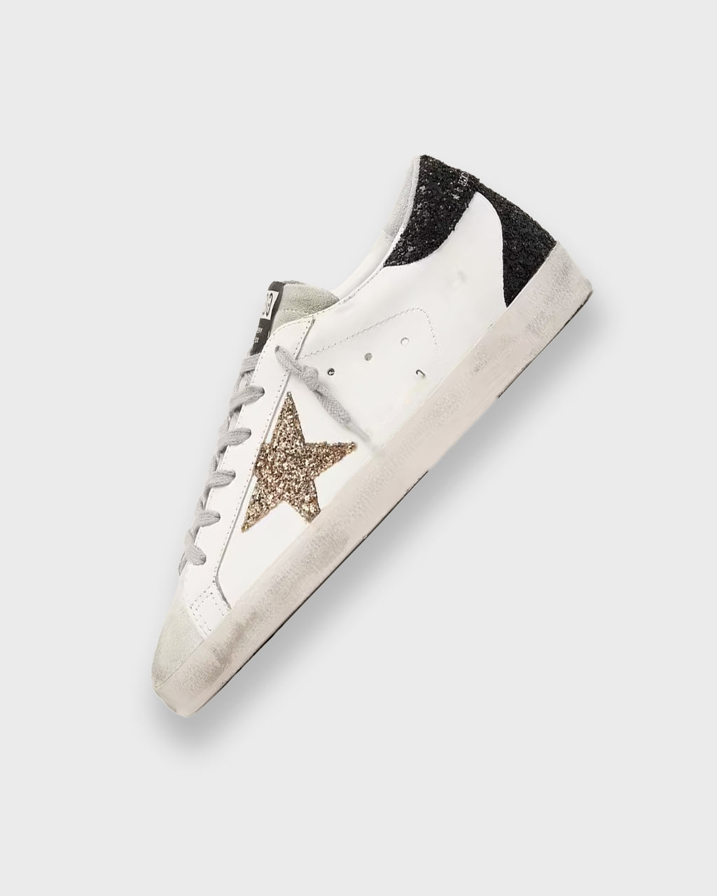 Sableau Glitter Star Sneakers in Black Gold — white leather, black glitter heel tab, gold glitter star