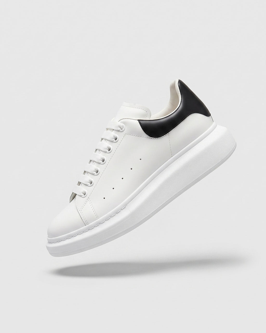 Sableau MQ Sneakers in white with black heel