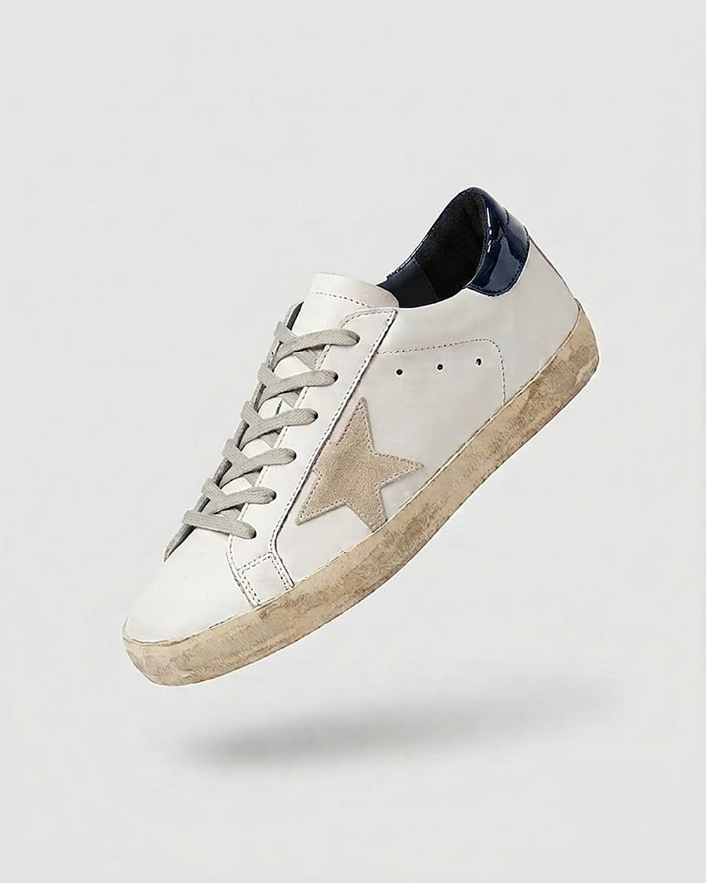 Sableau Star Sneakers in Gloss Navy — white leather, glossy patent dark navy heel tab, beige suede star